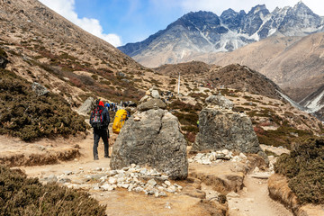 Scenic valley and Himalayan mountains peaks on the trek between Tengboche and Dingboche, Nepal.