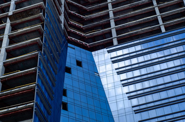 Fototapeta na wymiar Close-up of skyscraper building under construction.