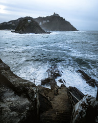 Old stone stairs into the ocean