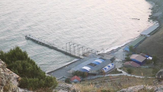 Aerial view on pier and beach of Sudak town from Sudak fortress.