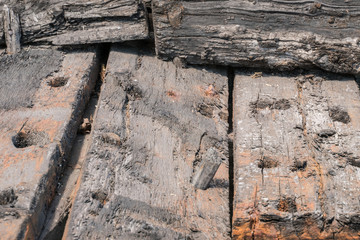   The remains of an ancient wooden vessel. The history of shipbuilding.