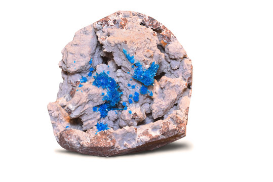 Blue pentagonite crystals isolated on white.