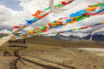 Prayer flags on a windy day in the Himalayas in Tibet