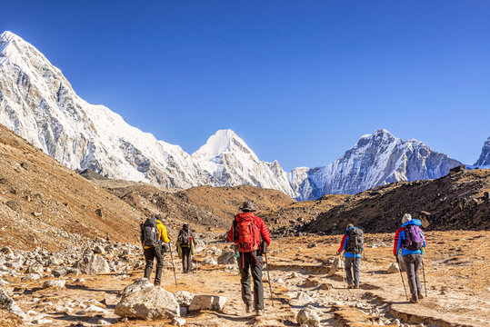 Himalayan mountains peaks and trekkers on the Everest Base Camp trek, Nepal