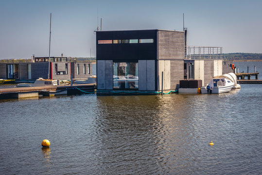 Houseboats for rent on Lake Jamno in Mielno town on the Baltic Sea coast in Poland