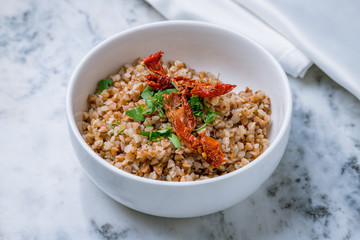 Boiled buckwheat on a bowl