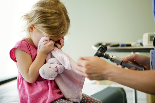 Young Girl Upset During Doctor Visit