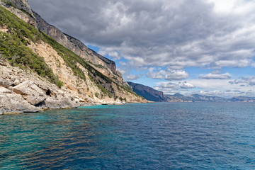 Fototapeta na wymiar Sailboat off the coast of Sardinia - Italy