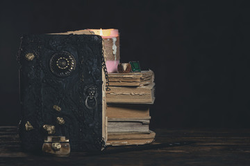 Book of magic on the magician table. Witchcraft.