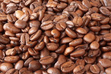 Pile of coffee beans. Close up macro image.