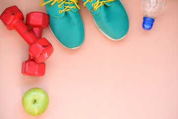 Sports Crafts, dumbbells, drinking water, apple. Sport