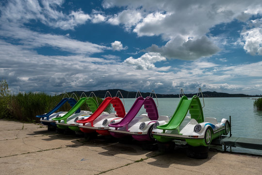 Colouful pedal boats at summer on Lake Balaton in Hungary