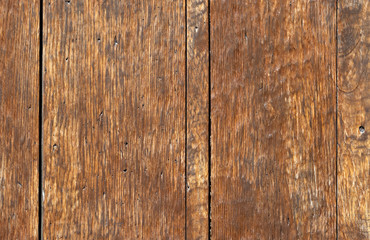 Close-up of a Old Paneled Wooden Door; Rusty and Weathered. Wood Texture Background