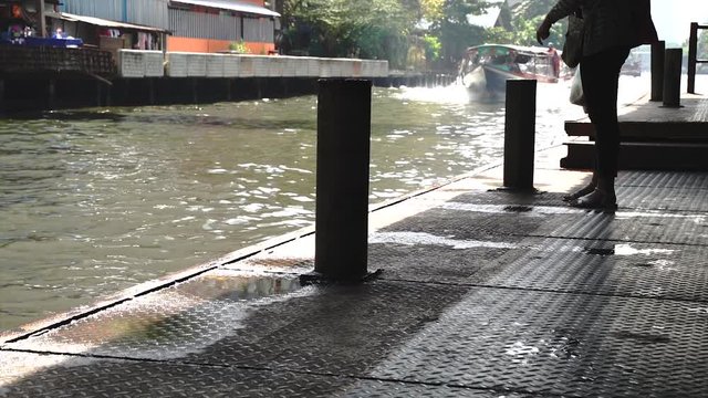 Saen Saep canal passenger boat, in Bangkok, the capital city of Thailand, atmosphere at noon.