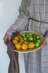 plum and apricot fruits in the wooden plate for food photography concept or healthy life.
