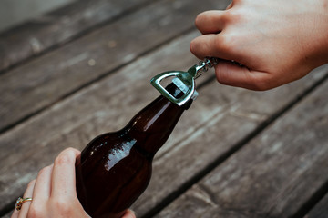 Beer bottle is opened ope in garden