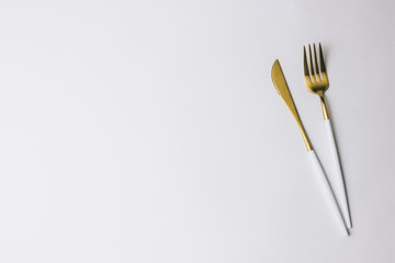 Fork and knife on white background.