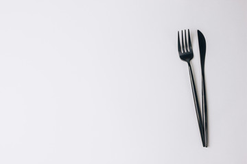 Fork and knife on white background.