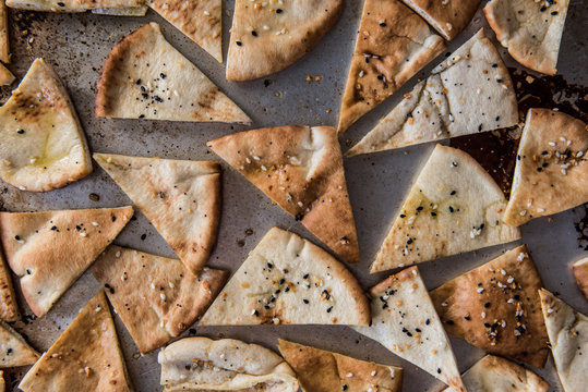 Pita chips on baking sheet