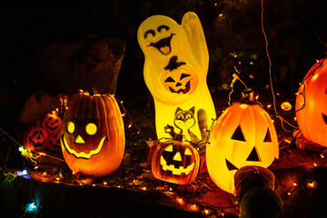 Scary halloween decorations outdoors at night close up