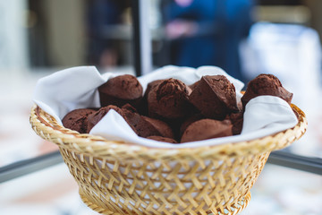 Beautifully decorated catering banquet table with variety of different pastry and bakery, with croissants and cookies on corporate christmas birthday party event or wedding celebration