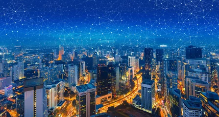 Poster Panoramic building modern business district at night with lines and dots of connection in the sky. Wireless internet network in smart city. © farizun amrod