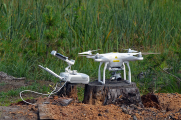 Fototapeta na wymiar Drone quadrocopter in the forest.