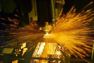 Laser cutting. Metal machining with sparks
