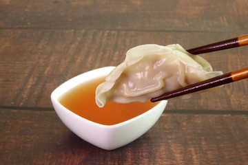 Dumpling : Chinese / Japanese dumplings, delicious traditional asian food. Japanese dumpling or Gyoza, Chinese dumpings or Jiaozi. Selective focus with copy space.