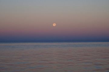 The setting moon over the Gulf of Mexico off East Cape Sable in Everglades National Park, Florida.