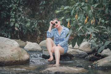  Women walking in the garden.