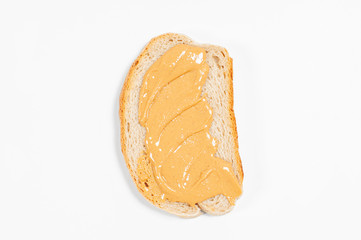 Peanut butter sandwiches. Breakfast, bread with peanut butter on white background