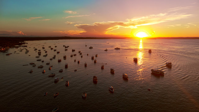 aerial view of sunset on the gamboa morro de s&atilde;o paulo beach