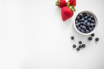 Fresh Strawberries and Blueberries on Isolated White Background