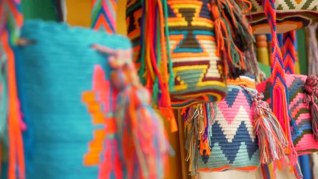 Colorful wayuu bags hanging outside