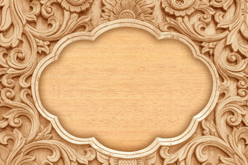 Pattern of flower carved on wood background