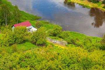 Torzhok. House on the bank of the river Tvertsa