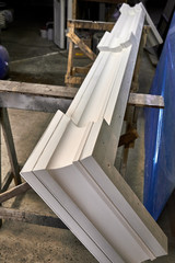 Crown molding of a classic wardrobe. Production of wood furniture. Furniture manufacture. Close-up