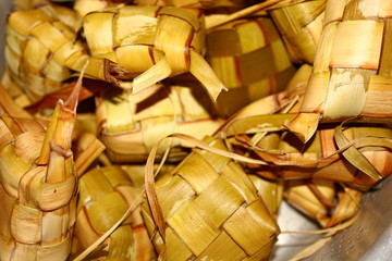 photo of Ketupat food, a kind of typical food that is served during Eid al-Fitr, there are some photos intentionally blurred to focus on one point