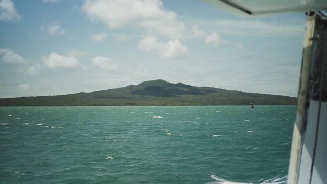 POV close up shot of the beautiful Rangitoto Island from the ferry in Auckland New Zealand