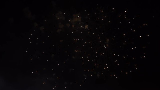 Abstract golden fireworks explosion on transparent background. New Year celebration fireworks. Holiday fireworks on dark background