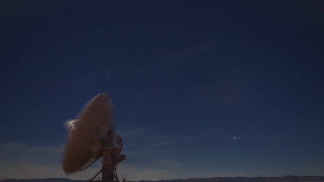 the radio telescope scans the starry sky (atacama desert, chile)time-lapse
