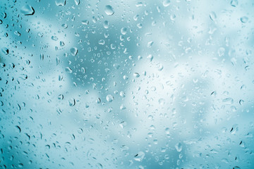 Rain drops on the windshield In the evening when heavy rain