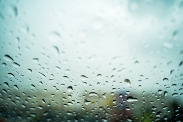 Rain drops on the windshield In the evening when heavy rain