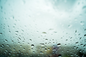 Rain drops on the windshield In the evening when heavy rain