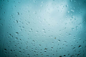 Rain drops on the windshield In the evening when heavy rain