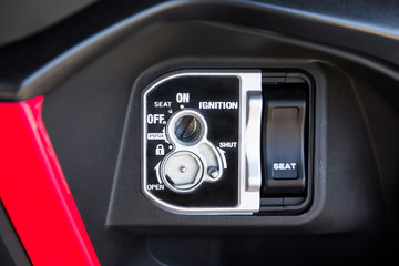 Motorcycle ignition background. Close up of motorcycle key ignition switch