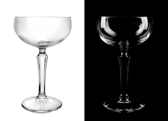 Empty glasses on white and black background