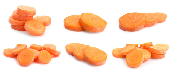 Set with slices of fresh ripe carrots on white background