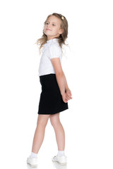 Fototapeta premium Fashionable little girl in a dress